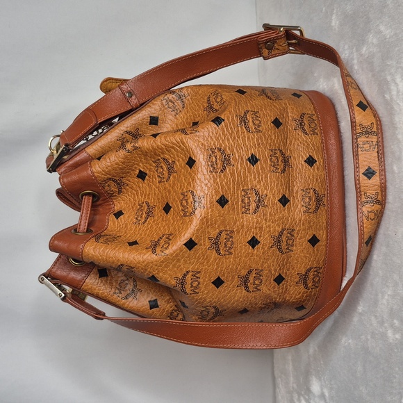 MCM Cognac Leather Drawstring Shoulder Crossbody Bucket Bag with Charm - Picture 3 of 17